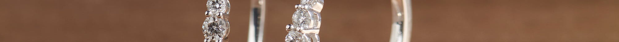 Round Graduated Solitaire Earrings