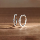 Round Graduated Solitaire Earrings