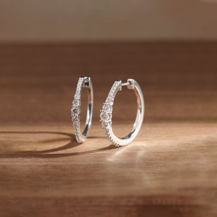 Round Graduated Solitaire Earrings