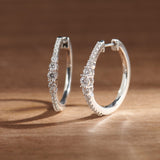 Round Graduated Solitaire Earrings